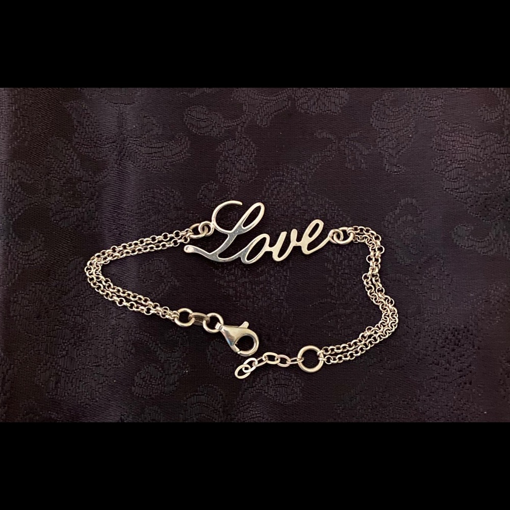 Silver “Love” bracelet